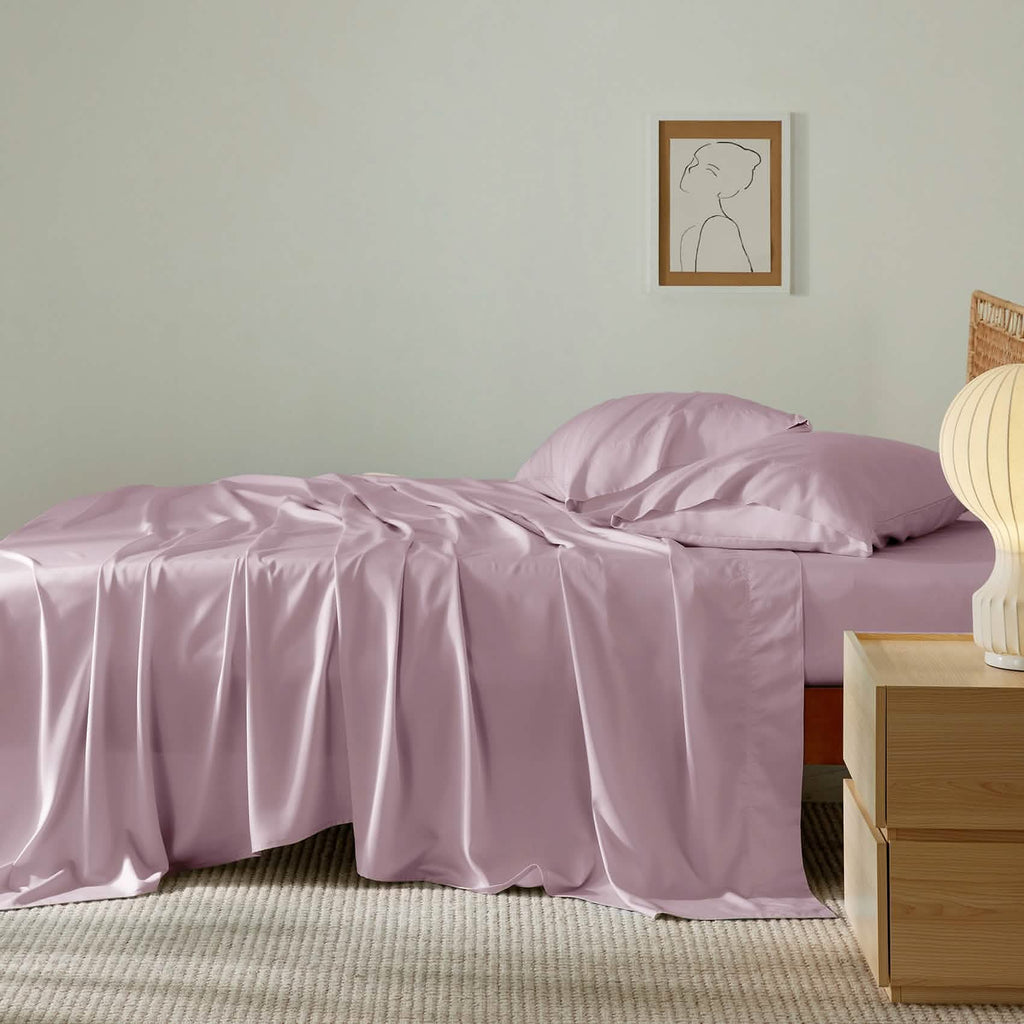 GentleSoft dusty rose rayon derived from bamboo sheet set with pillowcases, showcasing silky texture on a made bed.