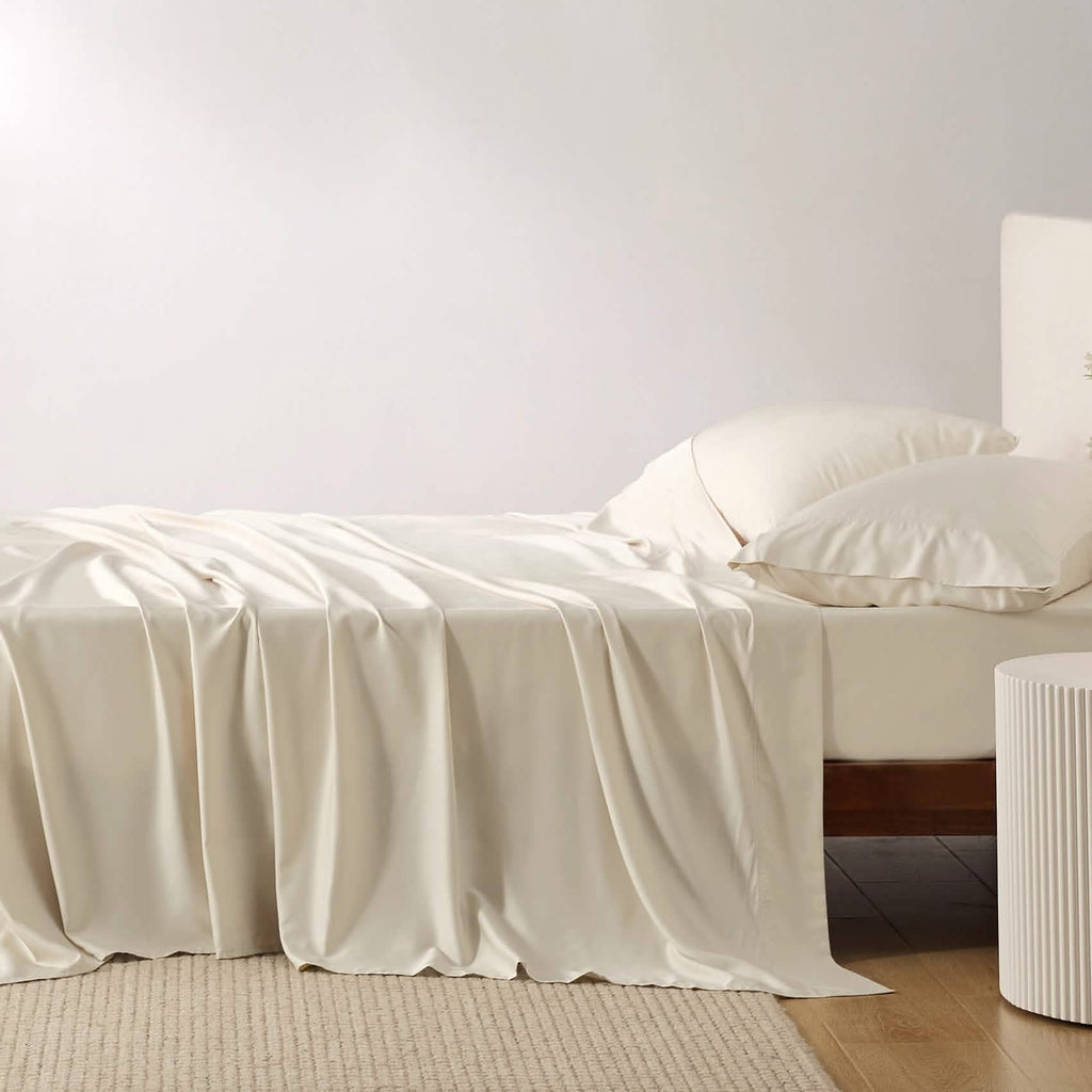 GentleSoft beige rayon from bamboo sheet set on bed, showcasing silky smooth texture and elegant drape.