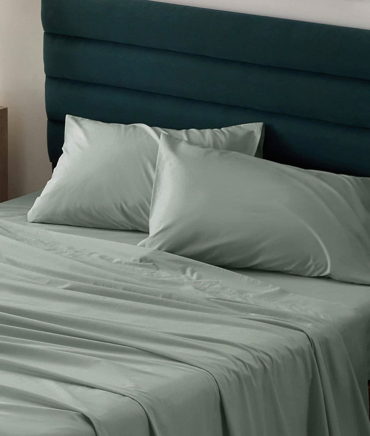 Soft sage green 100% cotton percale weave sheet set with pillowcases.