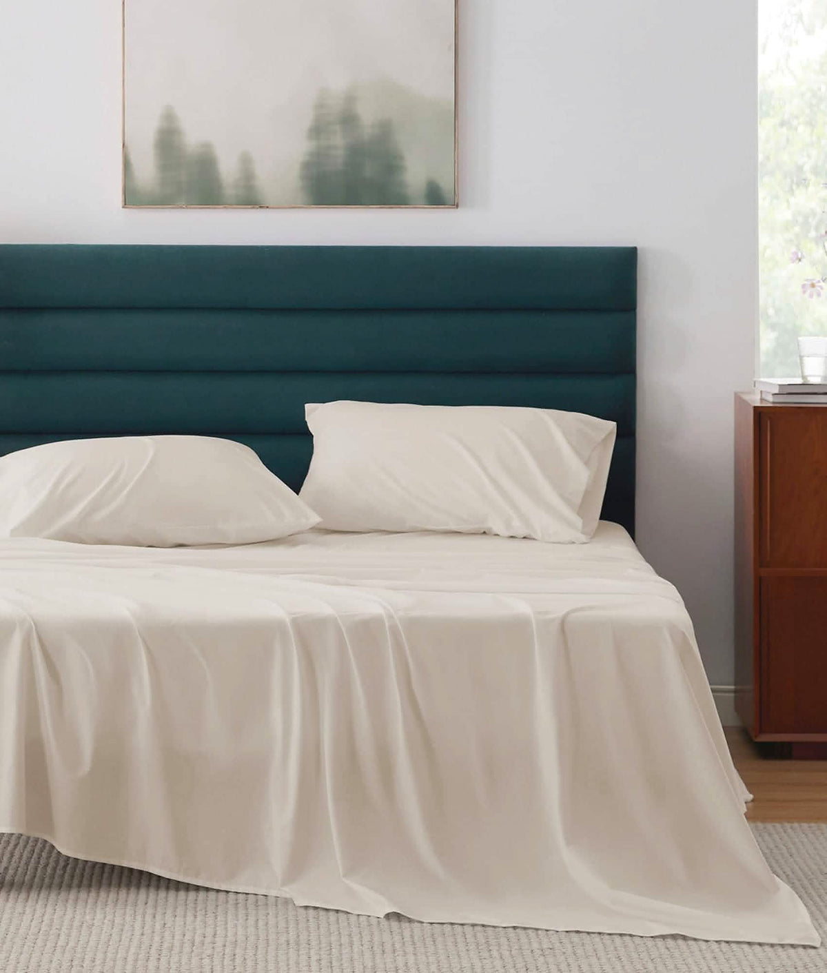 Soft, light cream 100% cotton percale weave sheet set on a bed, breathable comfort